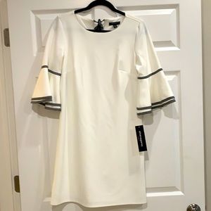 Dress with bell sleeve and accent trim